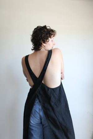 Kiki pinafore in black mid weight linen