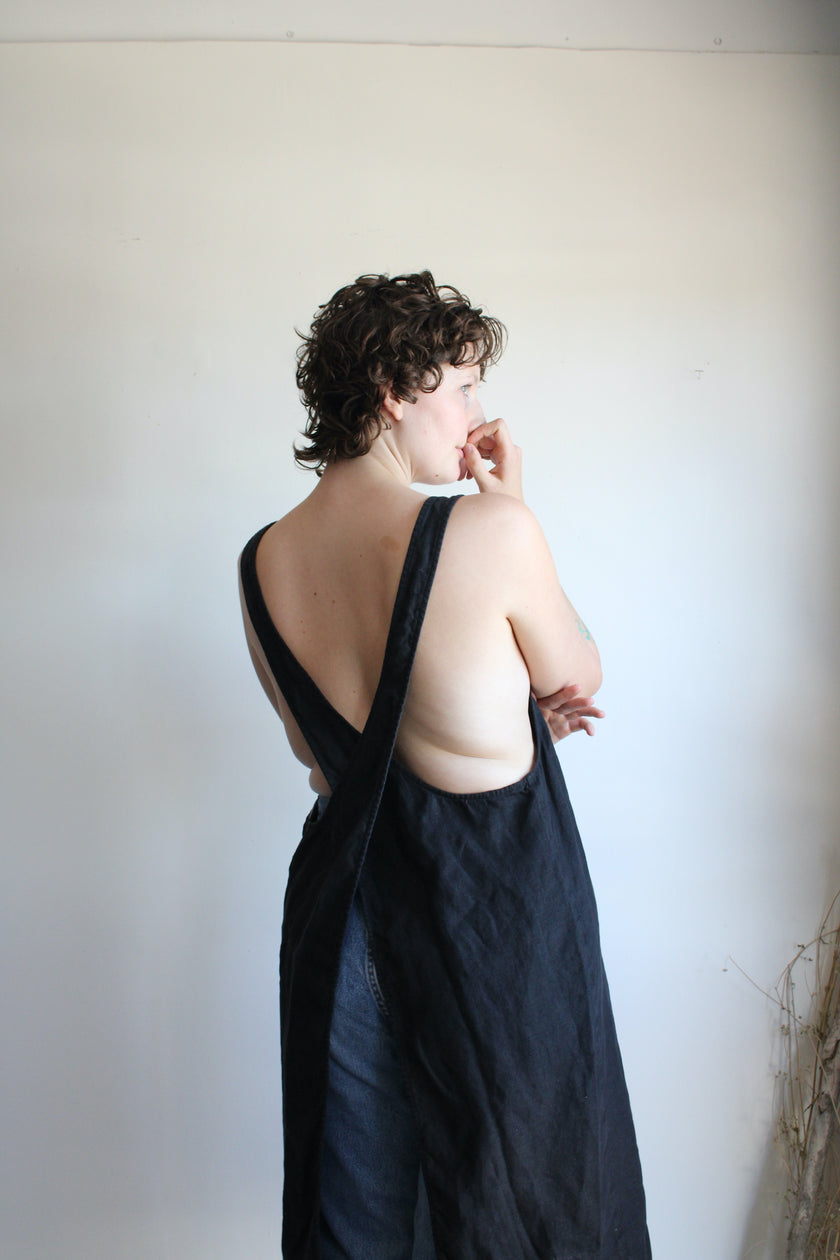 Kiki pinafore in black mid weight linen