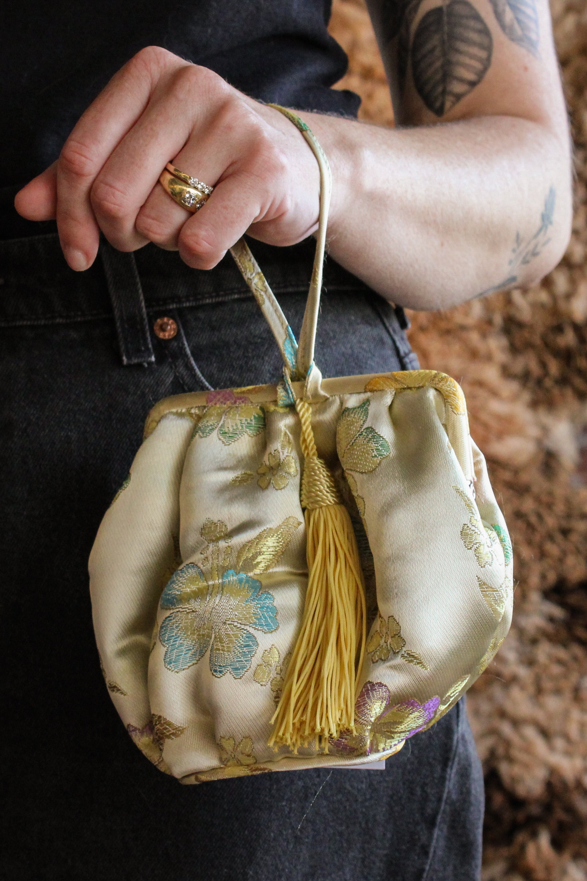 yellow floral satin tassel wristlet