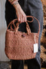 brown seagrass woven tote with long and short straps