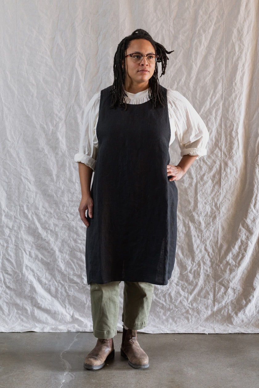 Kiki pinafore in black mid weight linen