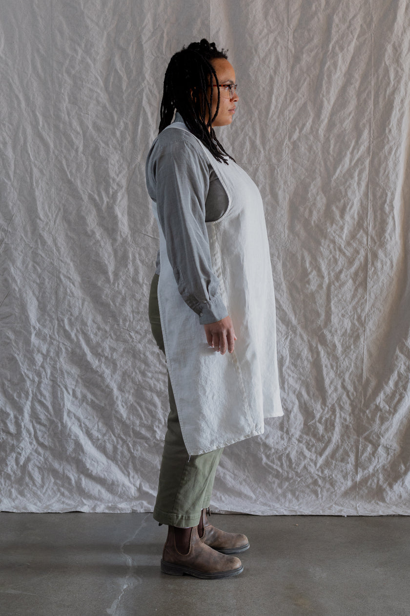 Kiki pinafore in white medium weight linen