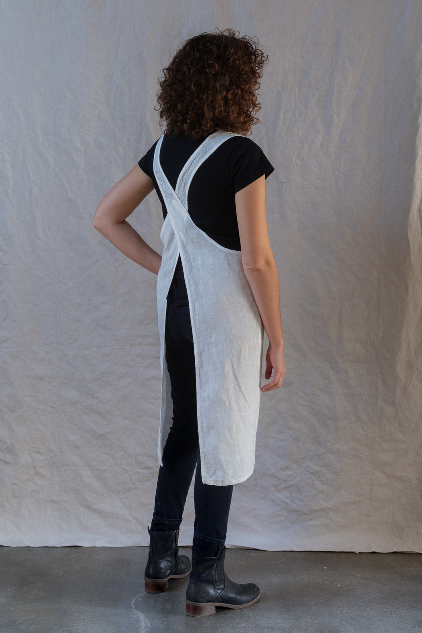 Kiki pinafore in white medium weight linen